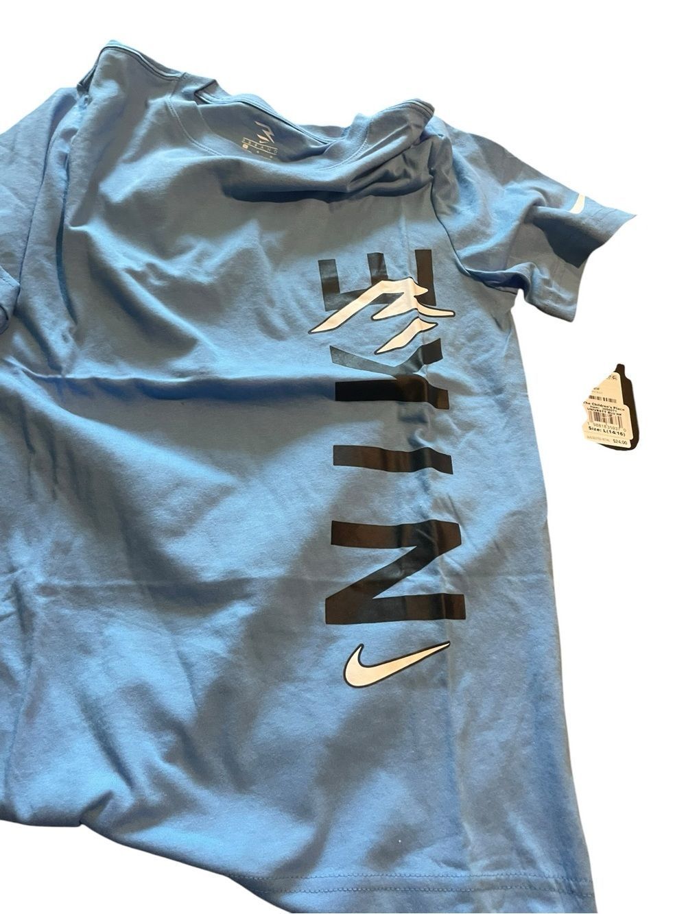 Nike Light Blue Short Sleeve Graphic Tee with Black and White Accents